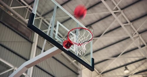 Basketball, games and shot in net, hoop and competition in campus court