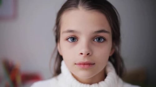 Young Girl Smiling in a Close Up Portrait