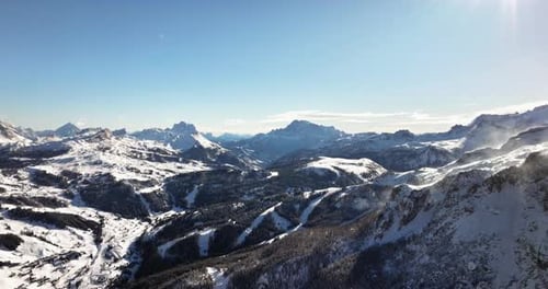 Aerial drone view of snow on the mountains in the Dolomites, Italy