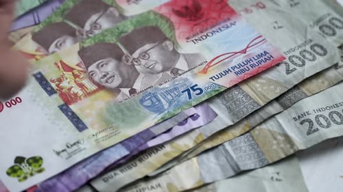 calculating rupiah as a means of payment in Indonesia