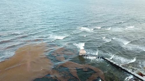 Pier With Huts On The End At The Coast Of The Caribbean Sea On Yucatan Peninsula In Quintana Roo, Me