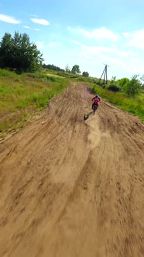 Dirt Bike Riding on a Rural Path