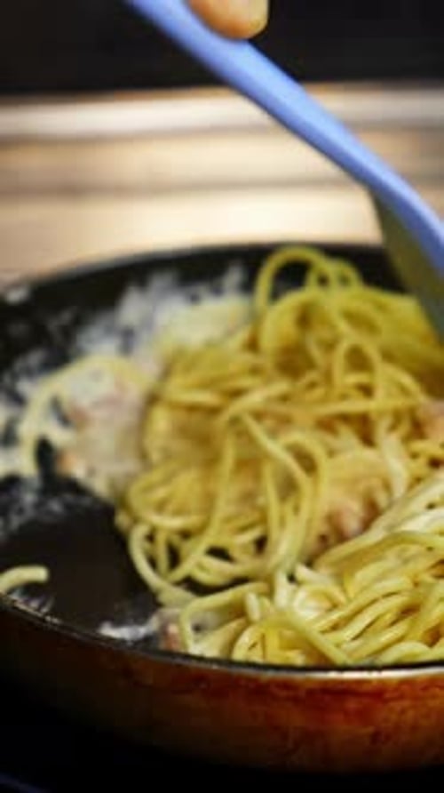 Creamy Spaghetti Cooking with Pasta and Sauce