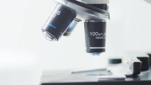 Closeup of Scientific Microscope Laboratory in Hospital Epidemic Disease Healthcare Vaccine Research