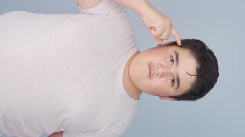 Vertical Video of Boy giving motivational speech to camera.