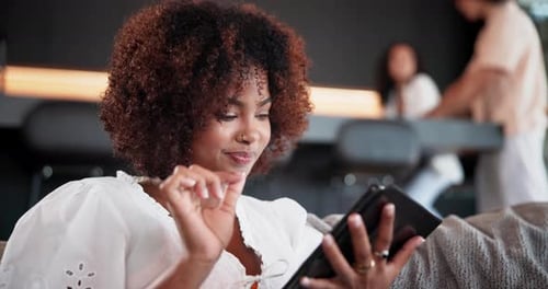 Woman using tablet in casual setting