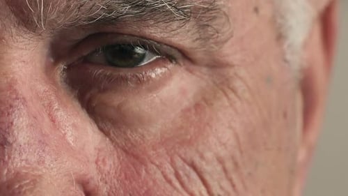 Close up of senior man's face and eye