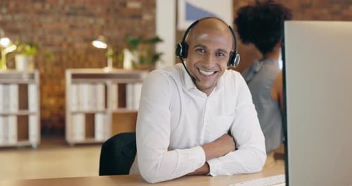 Call center, smile and face of man at computer for support, customer service
