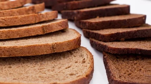 Close-Up of Sliced Bread on White Background