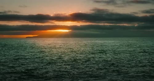 Sunset Cloudy Sky Over the Island La Gomera in Dark Blue Ocean Sun Rays Illuminate Sea