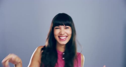 Young Woman Celebrates and Dances Happily