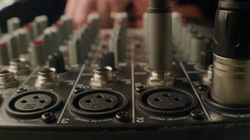 Audio Plugs Connect to Mixing Console Close Up