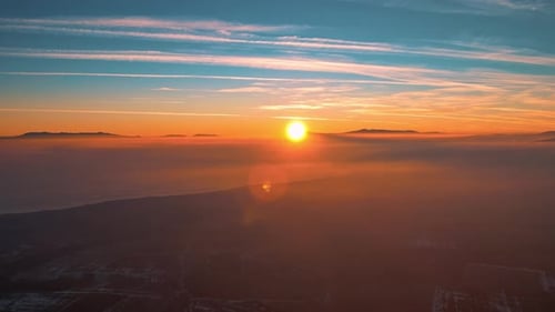 Sunset View on Foggy Lake