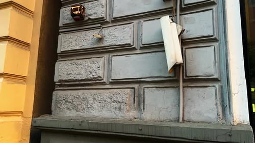 Building Surveillance Broken CCTV Camera Mounted on an Office Wall