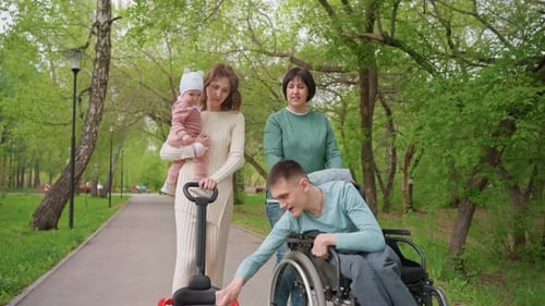 Family Strolling Through the Park