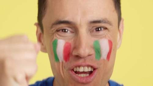 Close Up of a Man Supporting Italian Team
