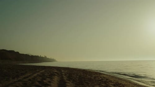 Beautiful View Sandy Beach at Sunrise Summer Time. Scenic Morning on Nature