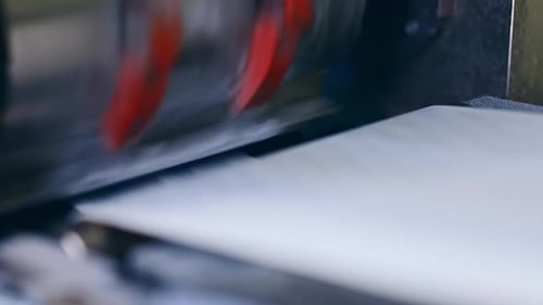 Machine Printing Sheets Inside Factory, Automated Production
