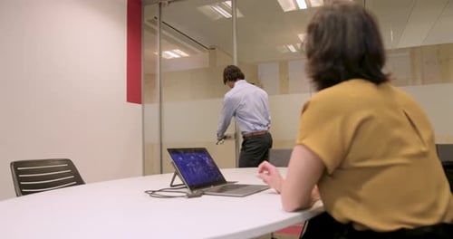 Two Professionals Business people Shaking Hands in Office