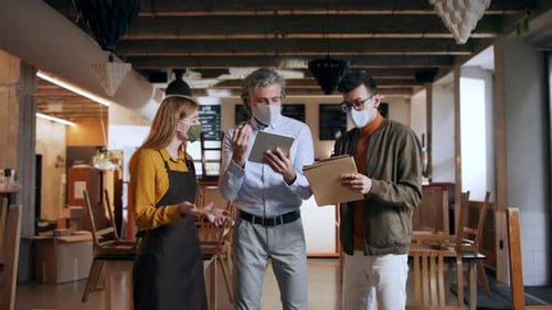 Frustrated Owner Manager Arguing with Waiter in Closed Cafe Small Business Lockdown