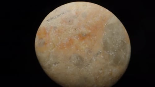 stone, the concept of the rotation of the planet. extreme macro, zoom. Slow falling and moving away