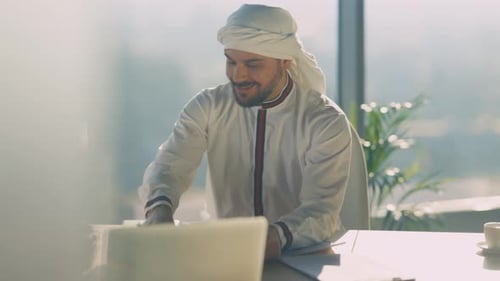 Arabic Businessmen Sitting at Office Cabinet Communicating Two Handsome Office Executives Discussing