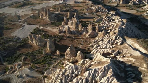 Cappadocia, Spain. Cinematic Aerial View of Scenic Rock Formations in Valley