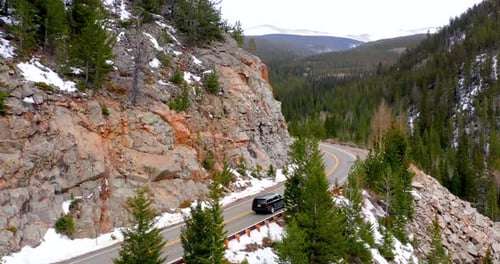 Rocky Mountains, Colorado / USA - April 11 2019: Car on Winding