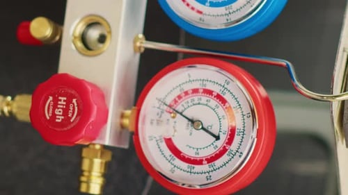 Pressure Gauges Measuring HVAC System Refrigerant