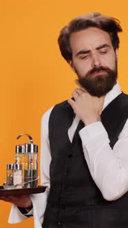 Vertical Video Butler Calculating Prices to Give Check