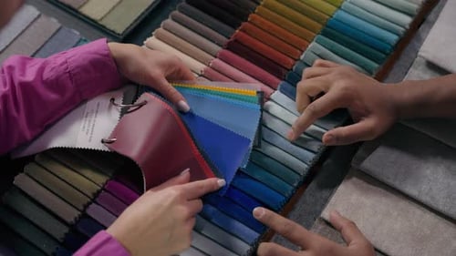 Fabric Swatches Selection with Two People's Hands