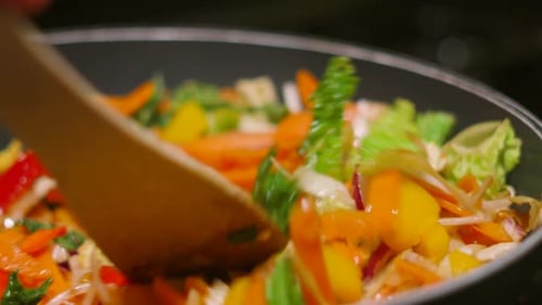Close up of Stir-Fry Vegetables Being Cooked in Wok