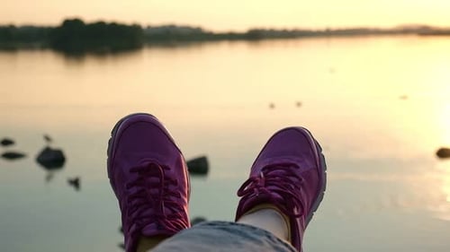 Relaxing by Lake at Sunset