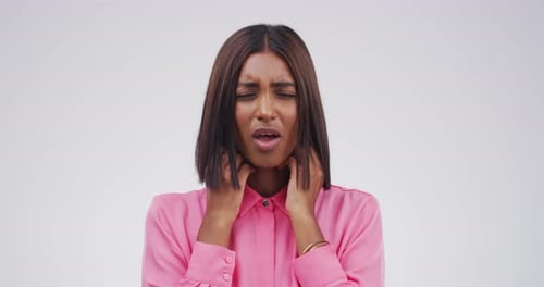 Woman Holding Sore Throat in Pain