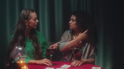 Fortune Teller and Her Friend Drinking Red Wine