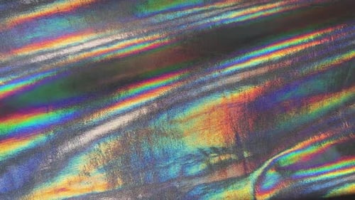 Abstract Shifting Holographic Rainbow Metallic Fabric Background