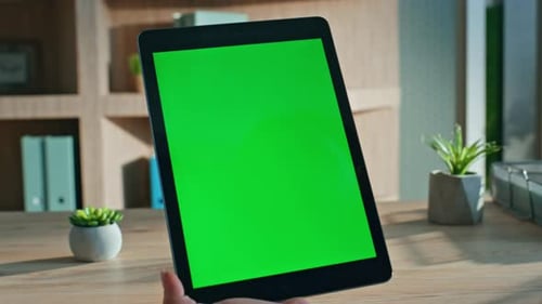 Woman Swiping Chromakey Tablet Working Remotely at Apartment Office Close Up