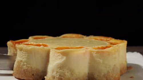 Cheesecake Cut with Knife for Birthday Celebration