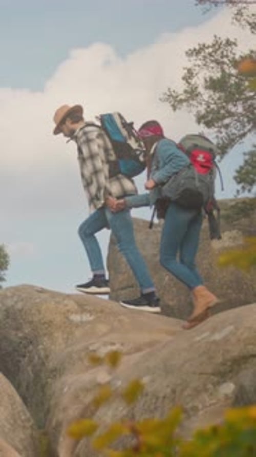 Adventurous Partners Take in Scenic View Together Two Travelers Enjoy Panoramic Mountain Landscape