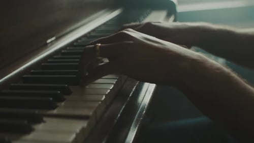 Pianist plays the piano in slow motion