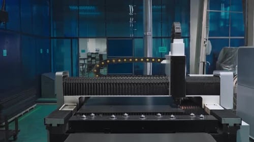 CNC Machine in the Factory Cuts Metal with Precision