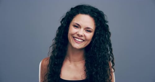 Smiling Woman Giving Thumbs Up Gesture