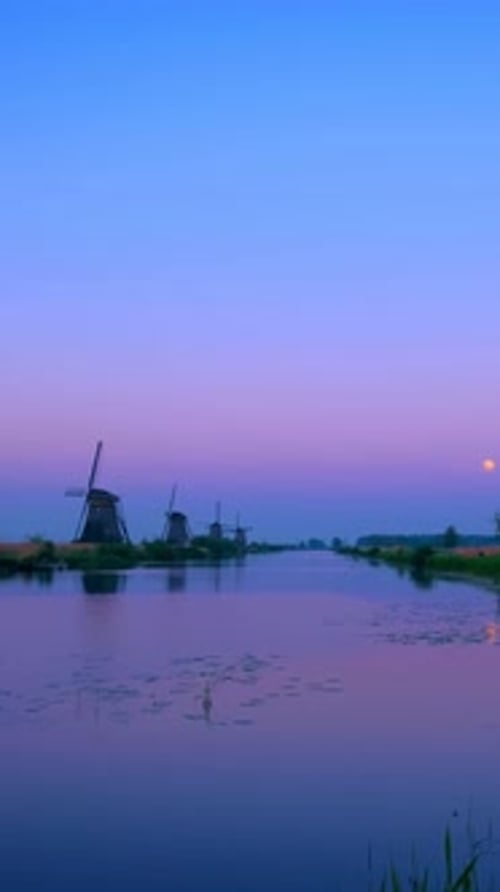 Windmills at Kinderdijk in Holland After Sunset Netherlands