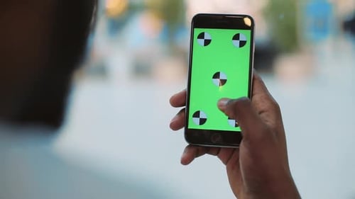 Close Up Man African American Hands Using Phone with Vertical Green Screen in Mall Hold Finger Hands