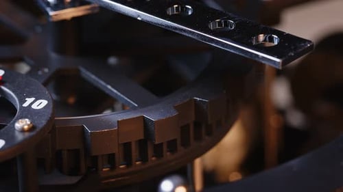 Intricate Mechanical Clockwork Gears Moving in Close Up