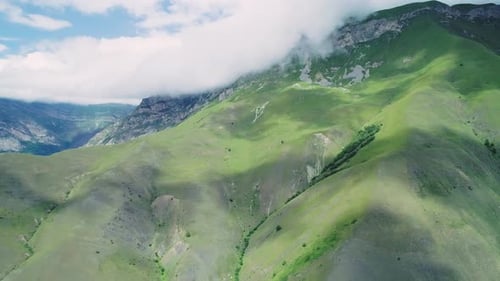 Aerial of Northern Caucasus Mountains on a Bright Sunny Day Majestic Scenery of Highlands of Region