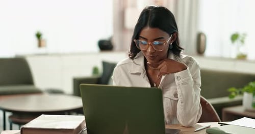 Laptop, Indian woman and student for online, typing and home with book for studying or project