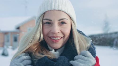 Smiling Woman in Winter Hat and Scarf