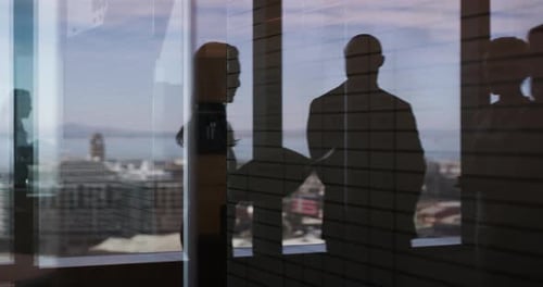 Business people, shadow and discussion with paperwork at office for interview, planning or proposal