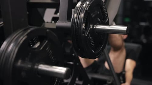 Leg Press Workout in a Dark Gym
